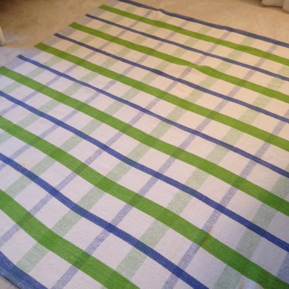 TAG  Cotton  woven rug; Approx.size- 5 feet x 5 feet